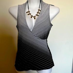 Gently worn White House, Black market extra small V-neck sleeveless shirt